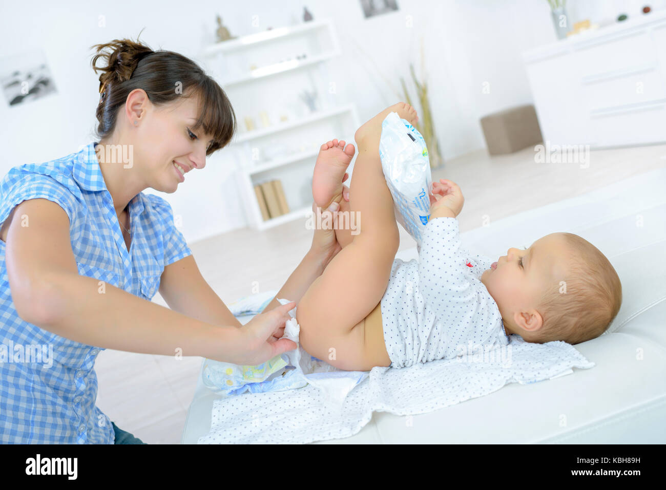 changing the baby's diapers Stock Photo Alamy