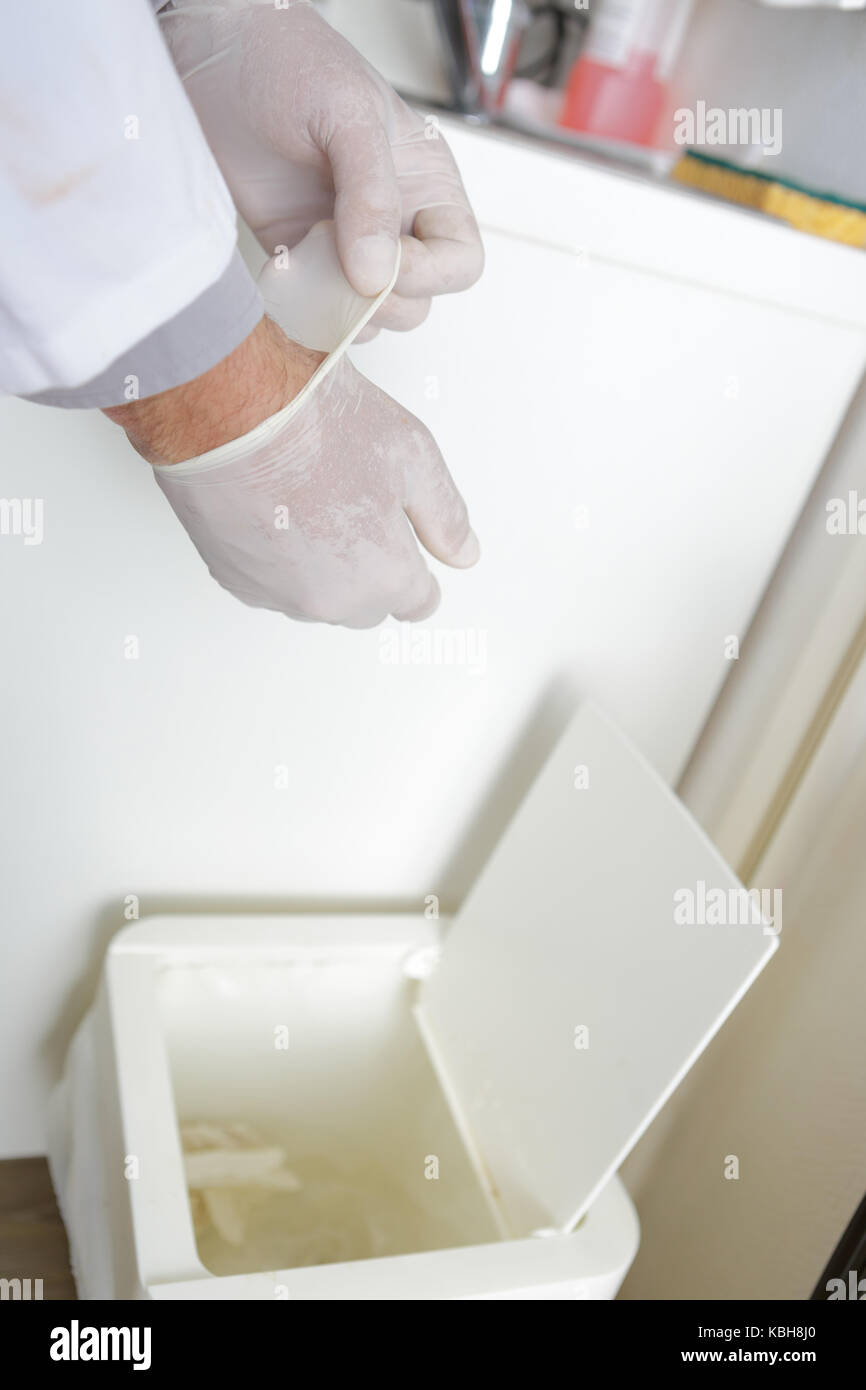 disposing of disposable gloves Stock Photo Alamy