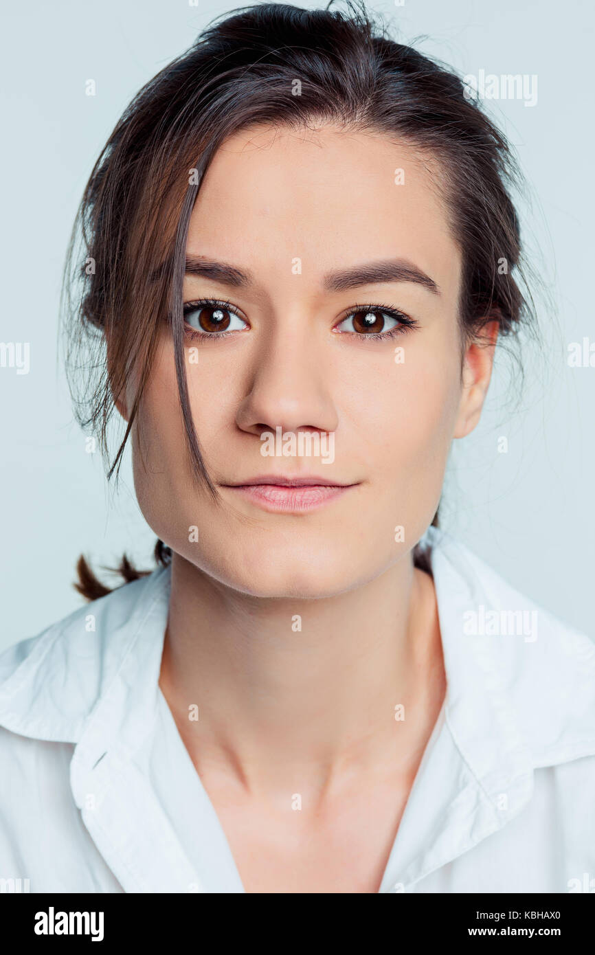 The young woman's portrait with thoughtful emotions Stock Photo - Alamy