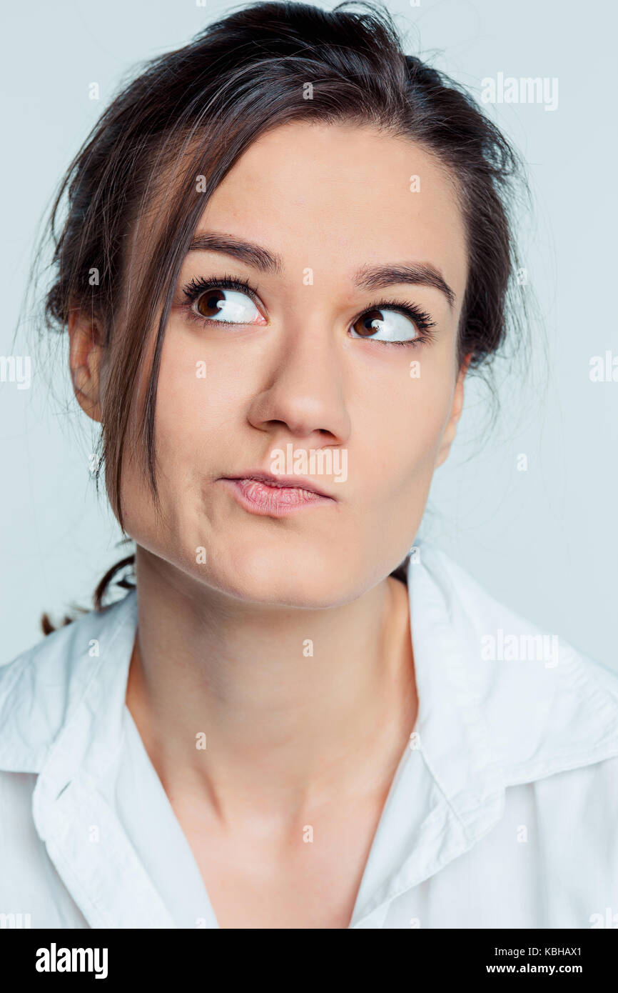 The young woman's portrait with thoughtful emotions Stock Photo - Alamy