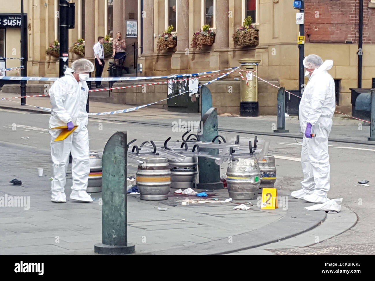 Forensics at the scene in Sheffield city centre where five people have ...