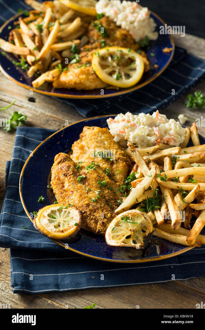 Spicy Homemade BAked Cajun Catfish with French Fries Stock Photo Alamy