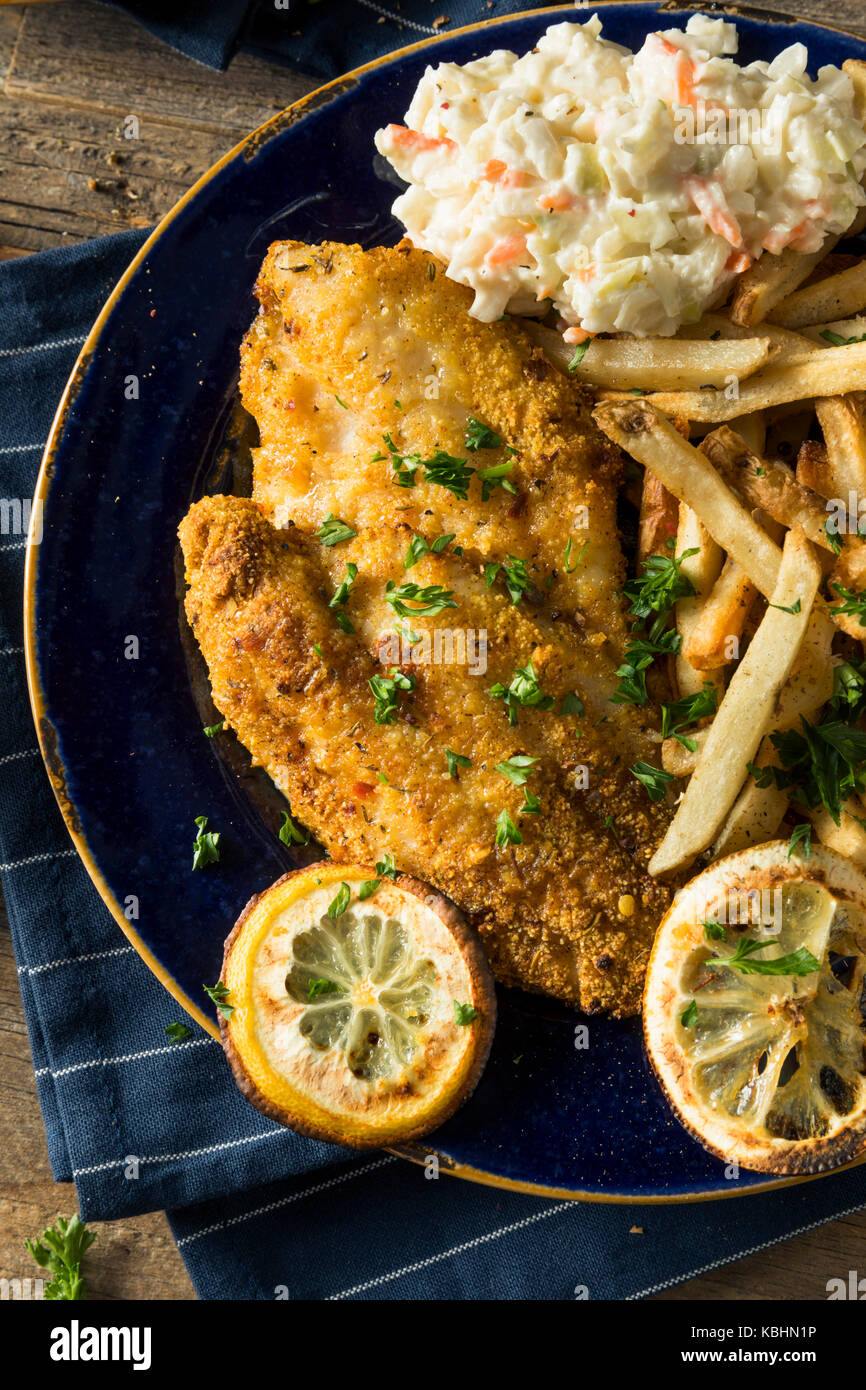 Spicy Homemade BAked Cajun Catfish with French Fries Stock Photo Alamy