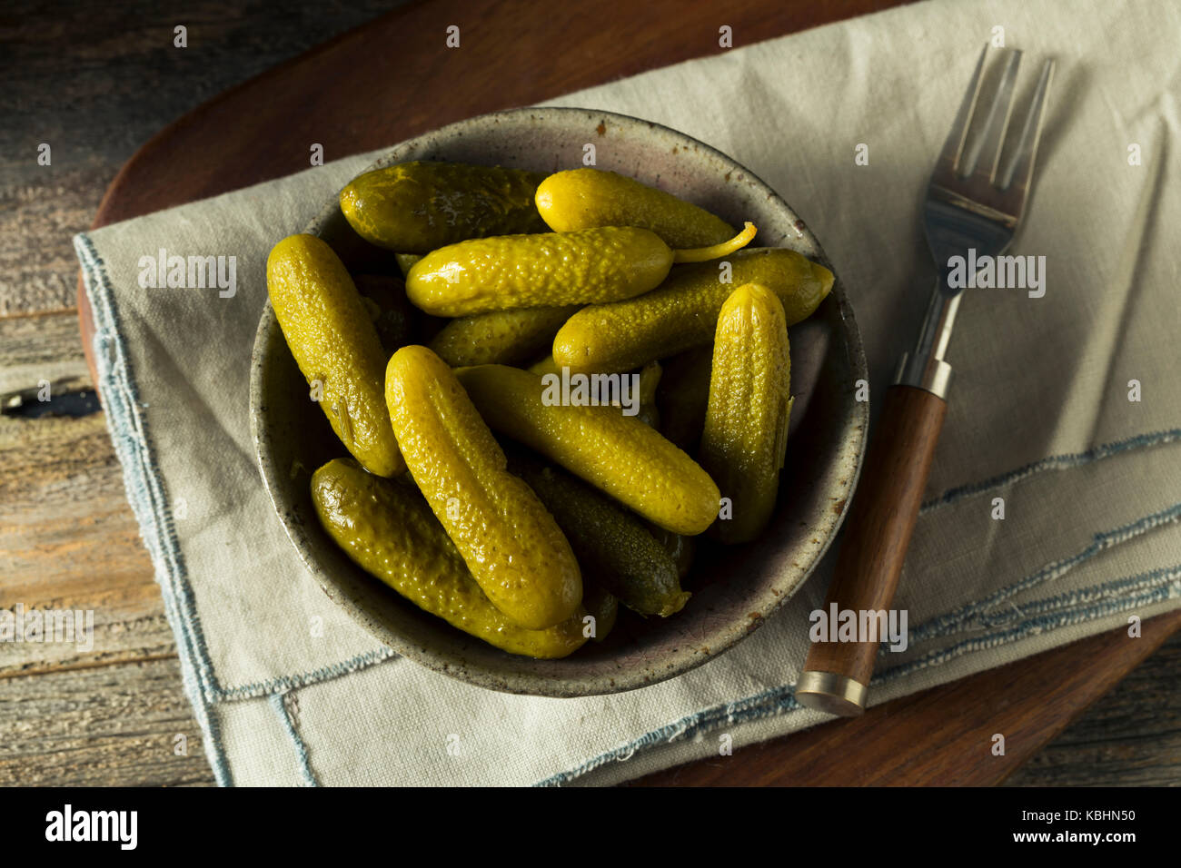 Pickled Organic Cornichon Gherkin Pickles with Dill and Spices Stock