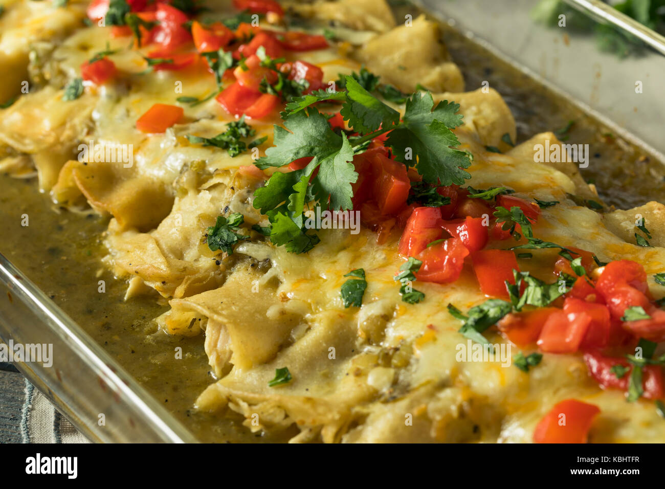 Homemade Green Chicken Enchiladas with Cilantro and Sauce Stock Photo Alamy