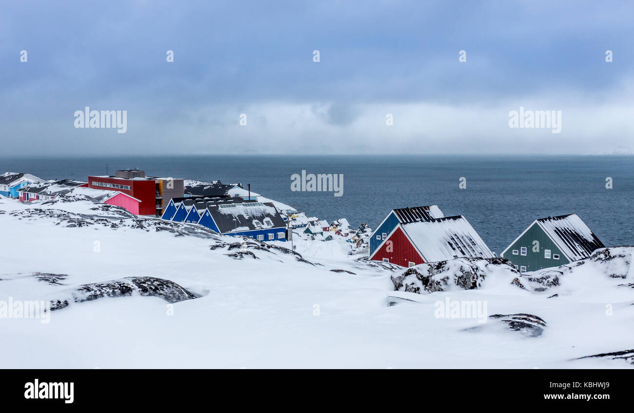 Colorful inuit houses and streets among the stones  in a suburb of arctic capital Nuuk Stock Photo