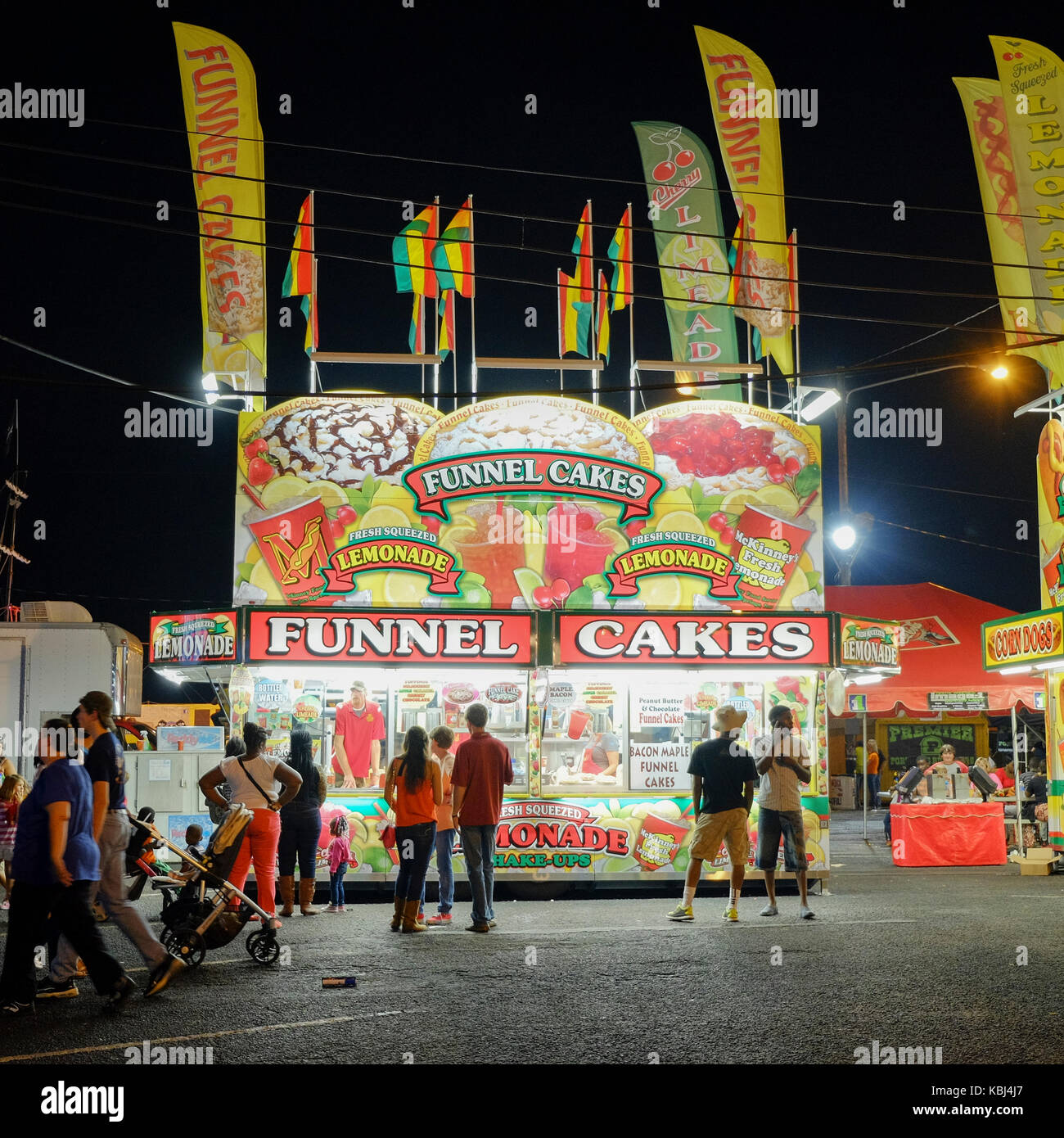 Carnival food vendor booth on the midway at the Alabama National Fair which is similar to a state fair, in Montgomery, Alabama, USA. Stock Photo