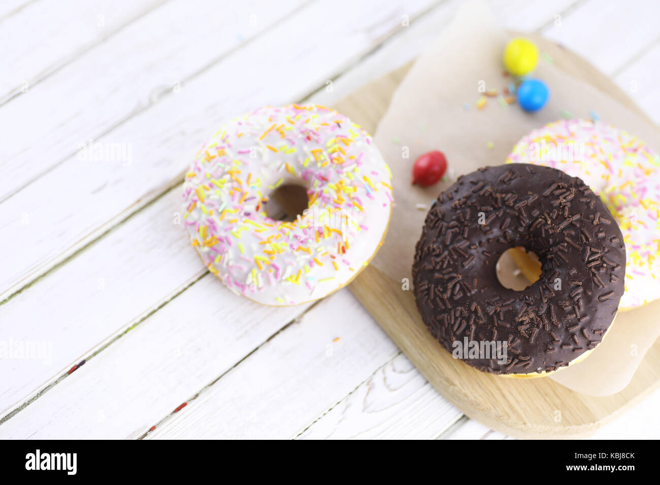 Chocolate Donut on a wooden white background Stock Photo - Alamy