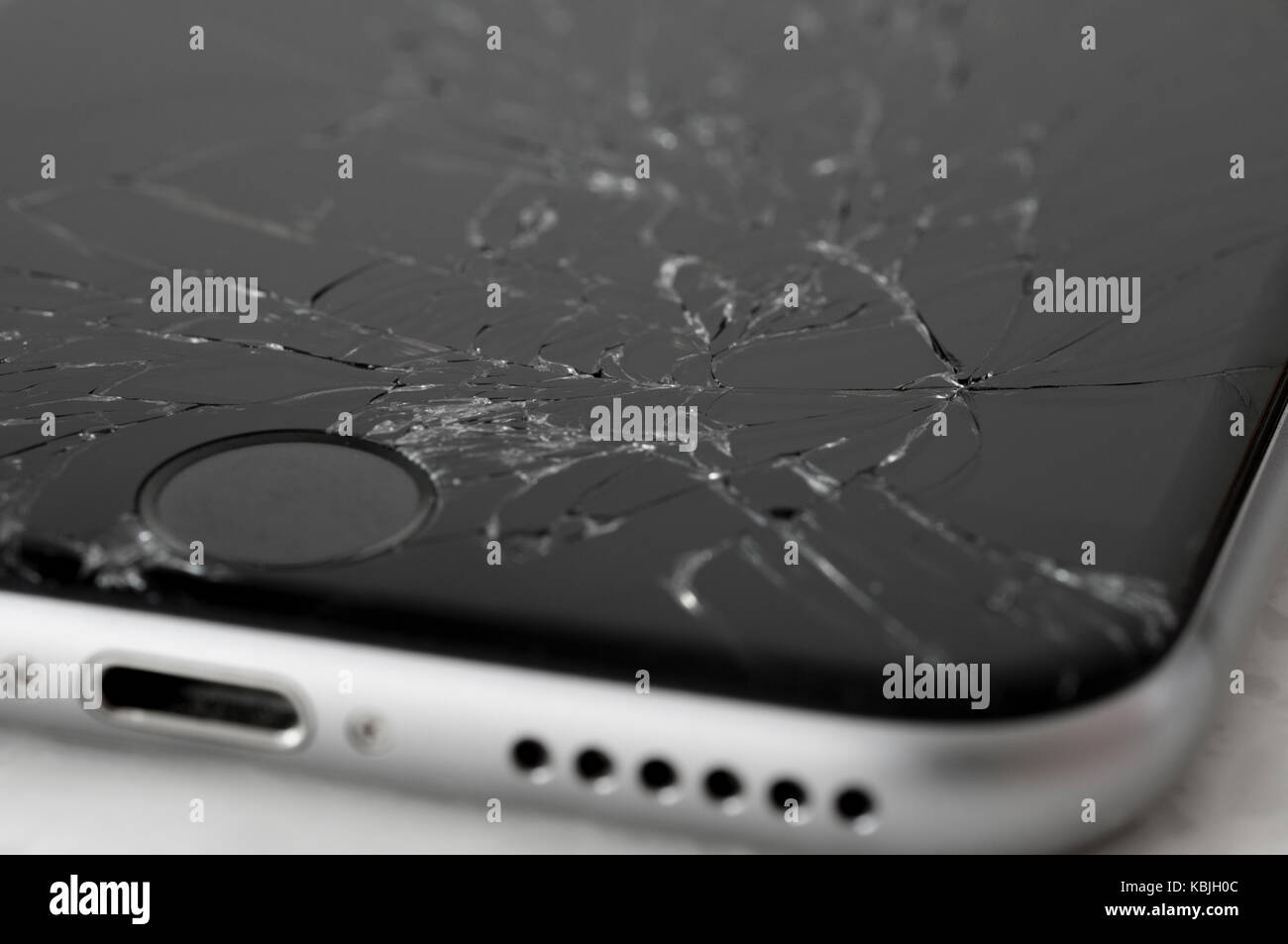 Apple iPhone 6s with broken screen Stock Photo