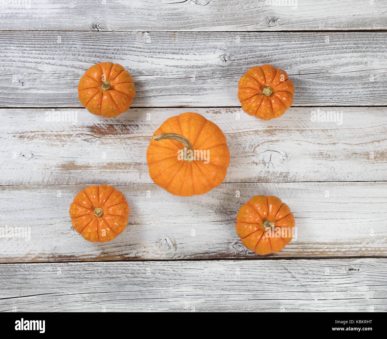 Autumn background with pumpkins on rustic white wood Stock Photo - Alamy