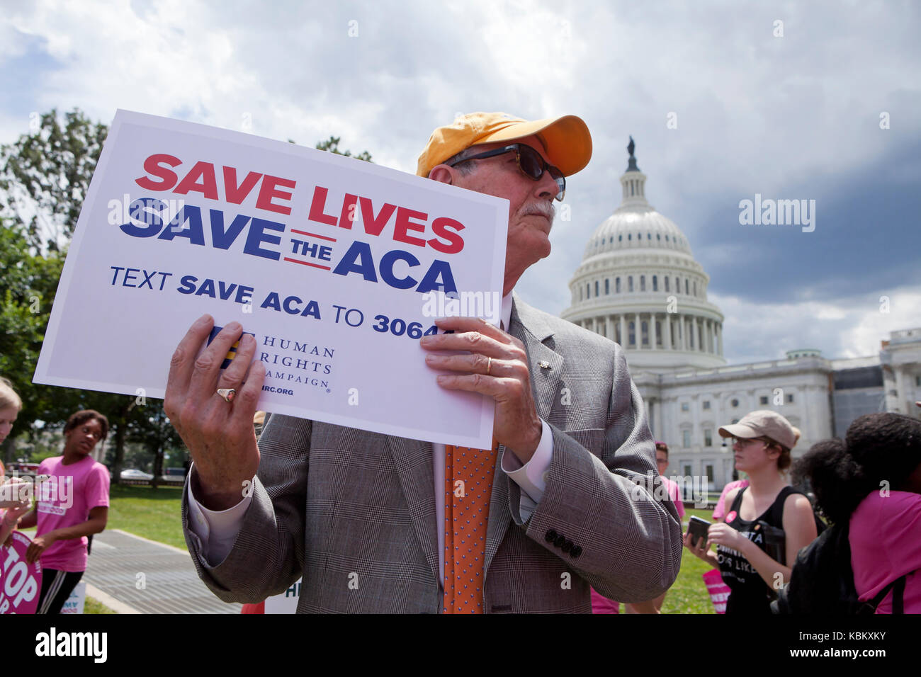 June 27, 2017: Liberals protest outside of US Capitol building to save Obamacare (Affordable Care Act), Medicare, and Medicaid - Washington, DC USA Stock Photo
