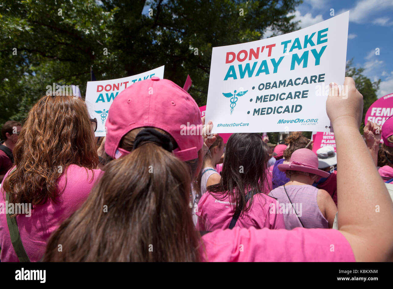 June 27, 2017: Liberals protest outside of US Capitol building to save Obamacare (Affordable Care Act), Medicare, and Medicaid - Washington, DC USA Stock Photo