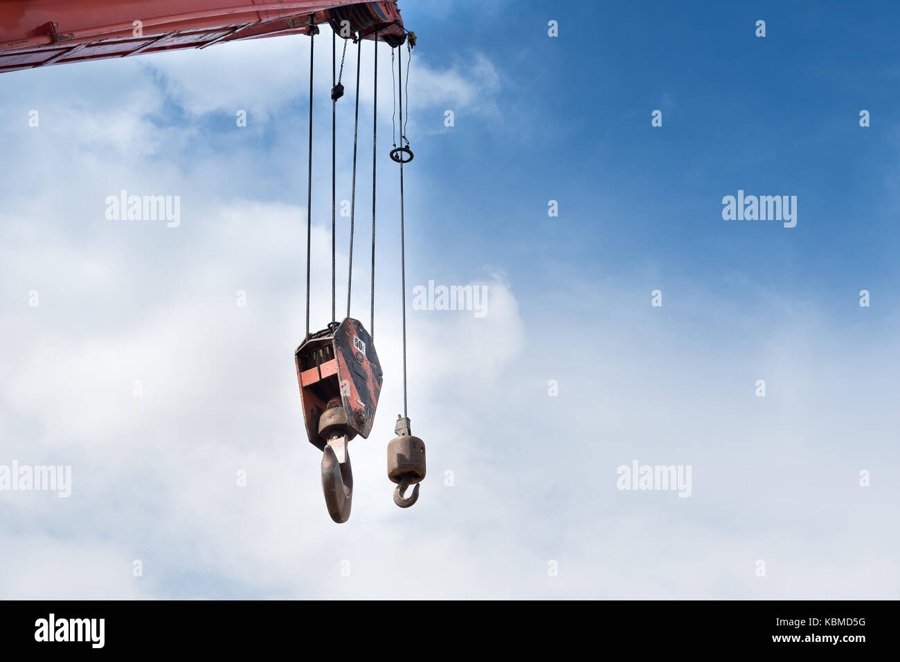 Crane hook weight lifting up to 50 tons against blue sky background Stock Photo Alamy