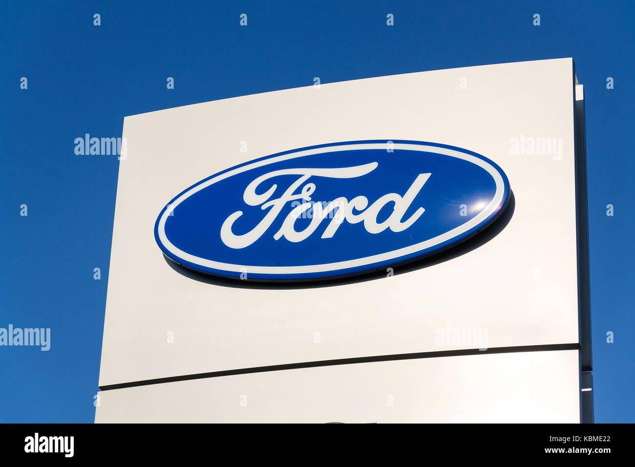 PRAGUE, CZECH REPUBLIC - SEPTEMBER 29: Ford motor company logo on dealership building on September 29, 2017 in Prague. Ford and Lyft will work togethe Stock Photo