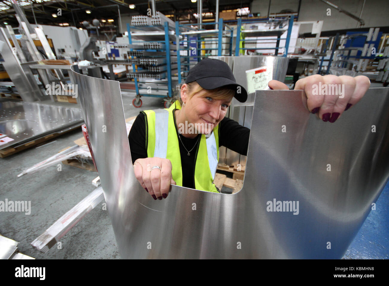 Blue collar workers in manufacturing Stock Photo Alamy
