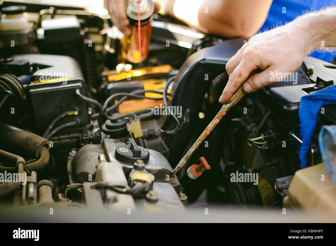 hands of an auto mechanic closeup. servicing and caring for a car