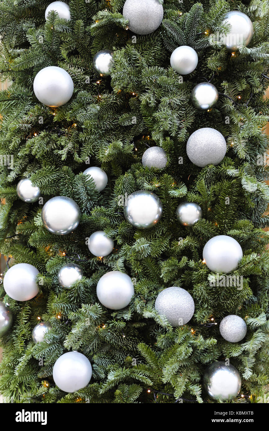 Christmas tree with silver bauble ornaments Stock Photo - Alamy