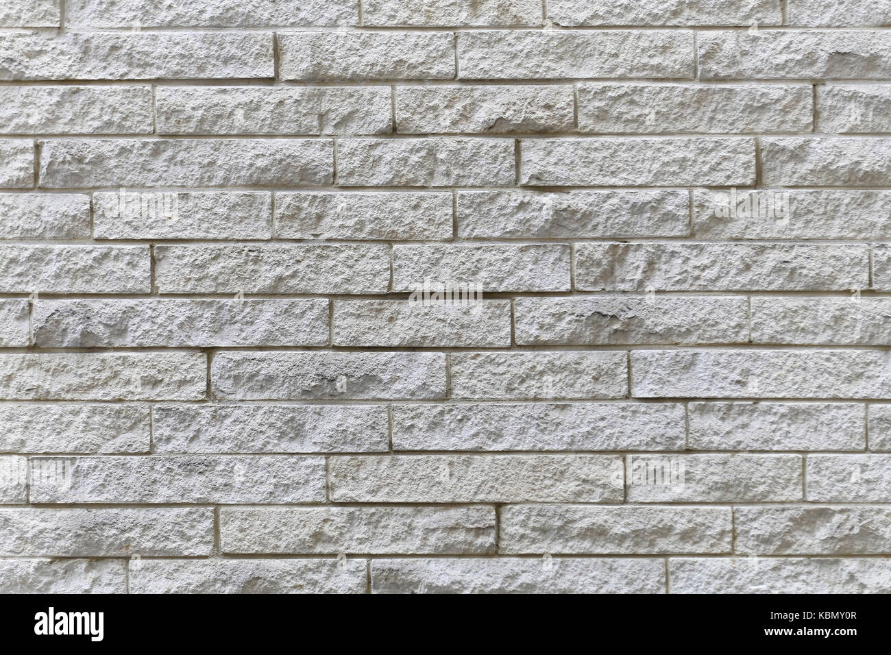 White brick wall with rough texture Stock Photo - Alamy