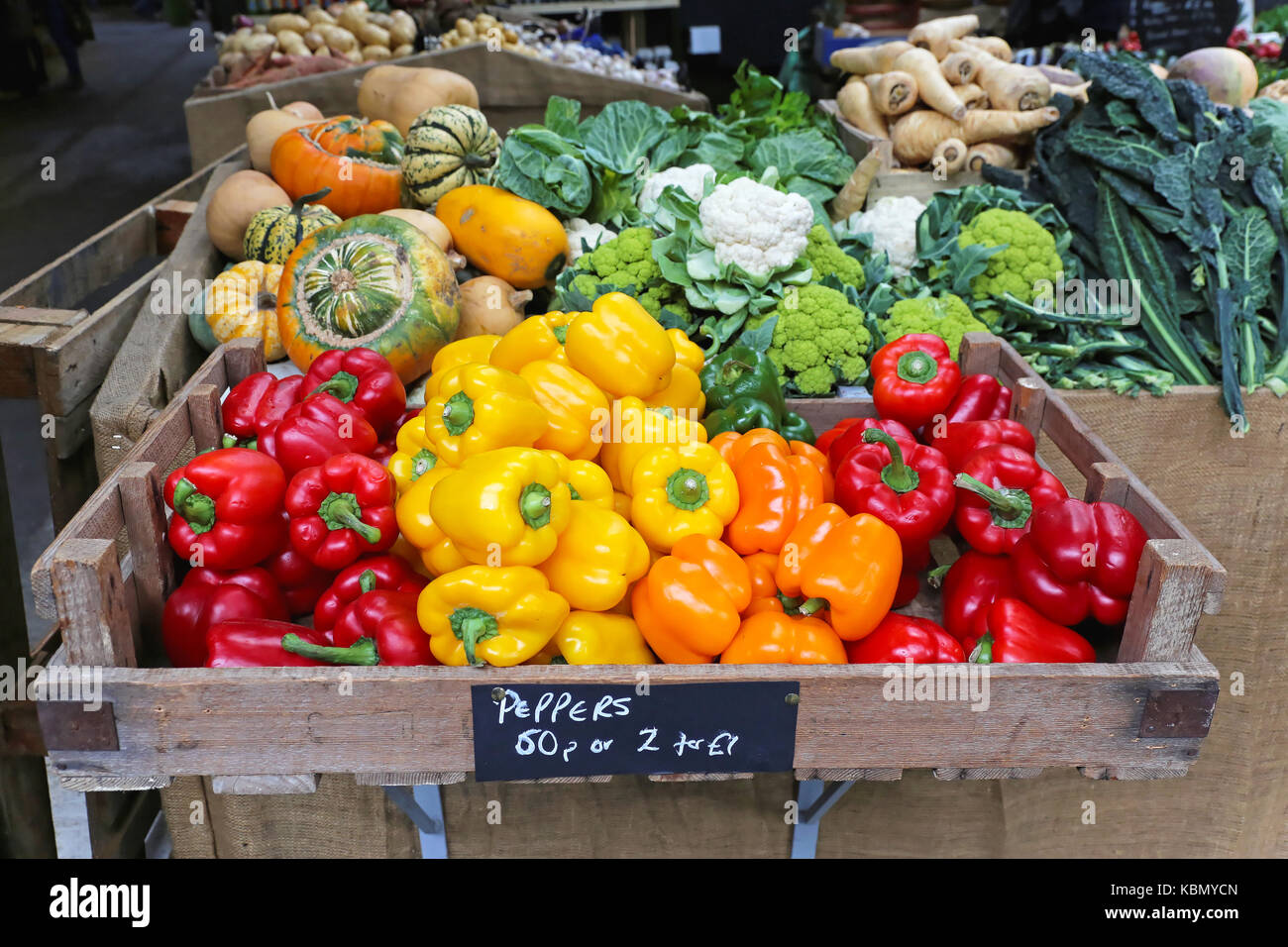 Colorful bell peppers at market stall Stock Photo - Alamy