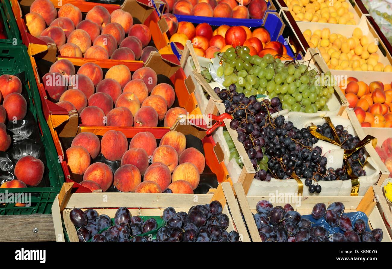 lots of fruit boxes for sale in the fruit and vegetable market Stock