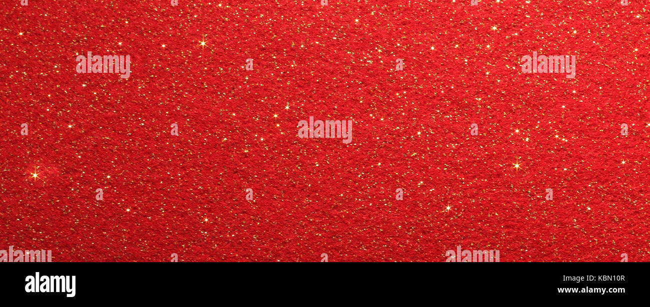 red glittery background with many shiny gold stars Stock Photo