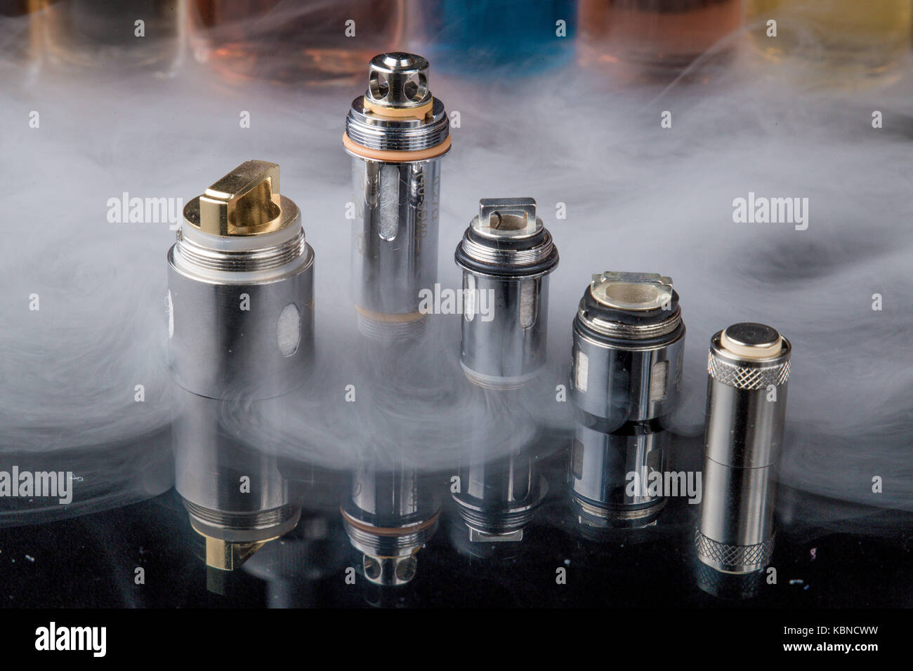 Electronic cigarette Clearomizer coils in smoke cloud Stock Photo Alamy