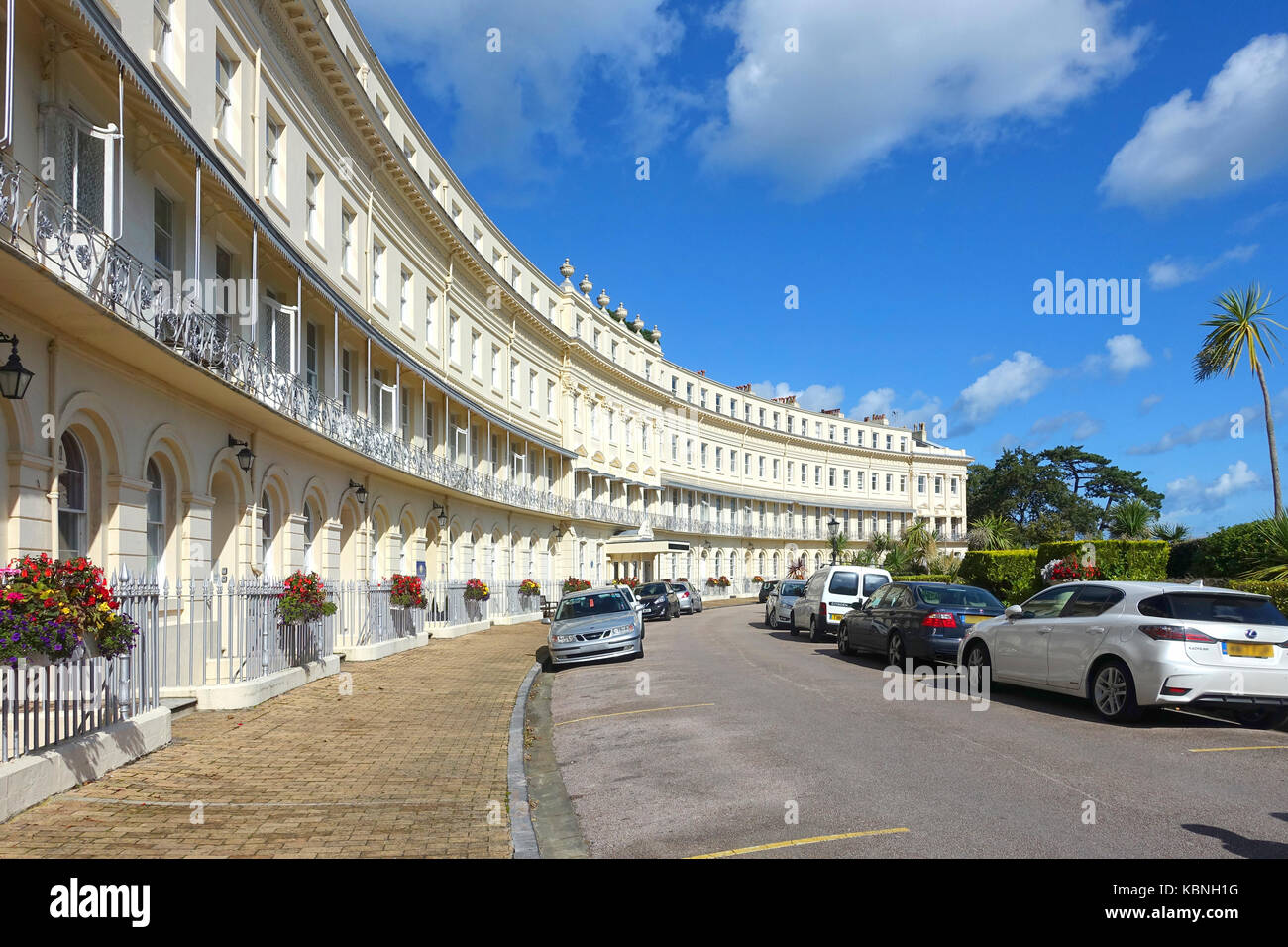 The sweeping curve of the Georgian / Regency terrace of the Osborne Hotel and Apartments, Meadfoot Beach, Torquay, Devon, UK on a sunny summer's day. Stock Photo