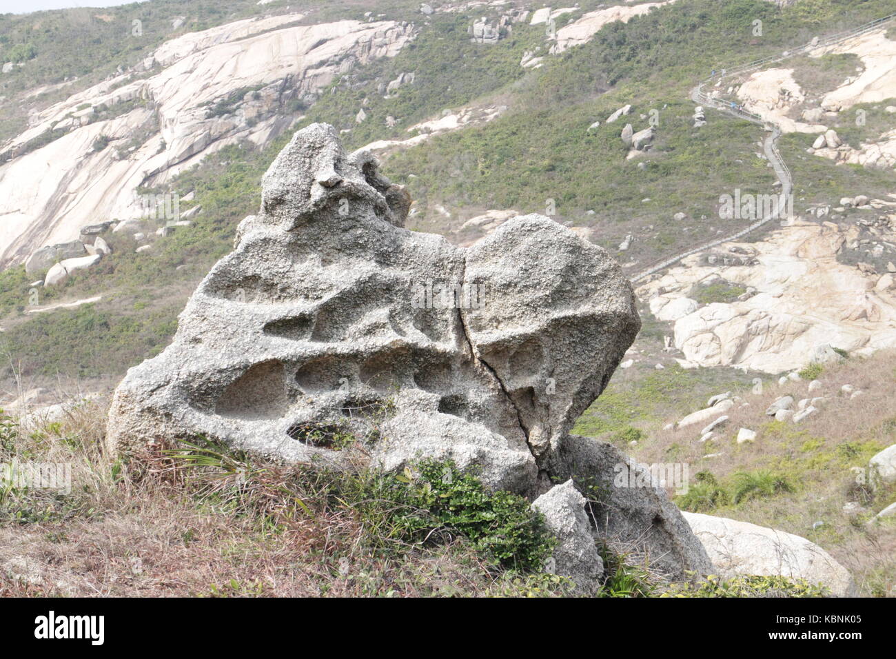 A BIG ROCK WITH WEATHERING Stock Photo