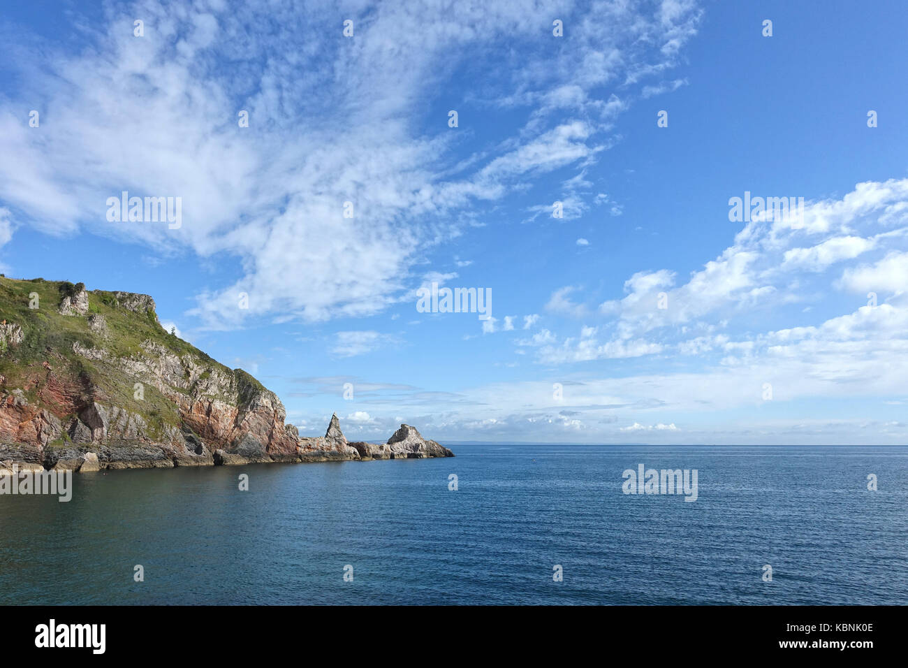 The unusual rock formation on the east side of Anstey's Cove, Torquay, Devon, UK on a beautiful sunny summer's morning. Stock Photo