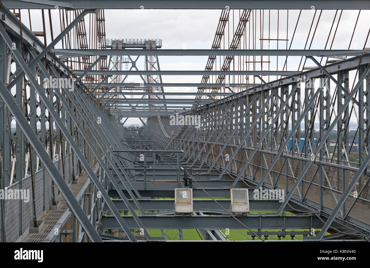View from western end of upper deck of Newport Transporter Bridge showing pedestrian walkways, cable stays, and suspension cables. Stock Photo