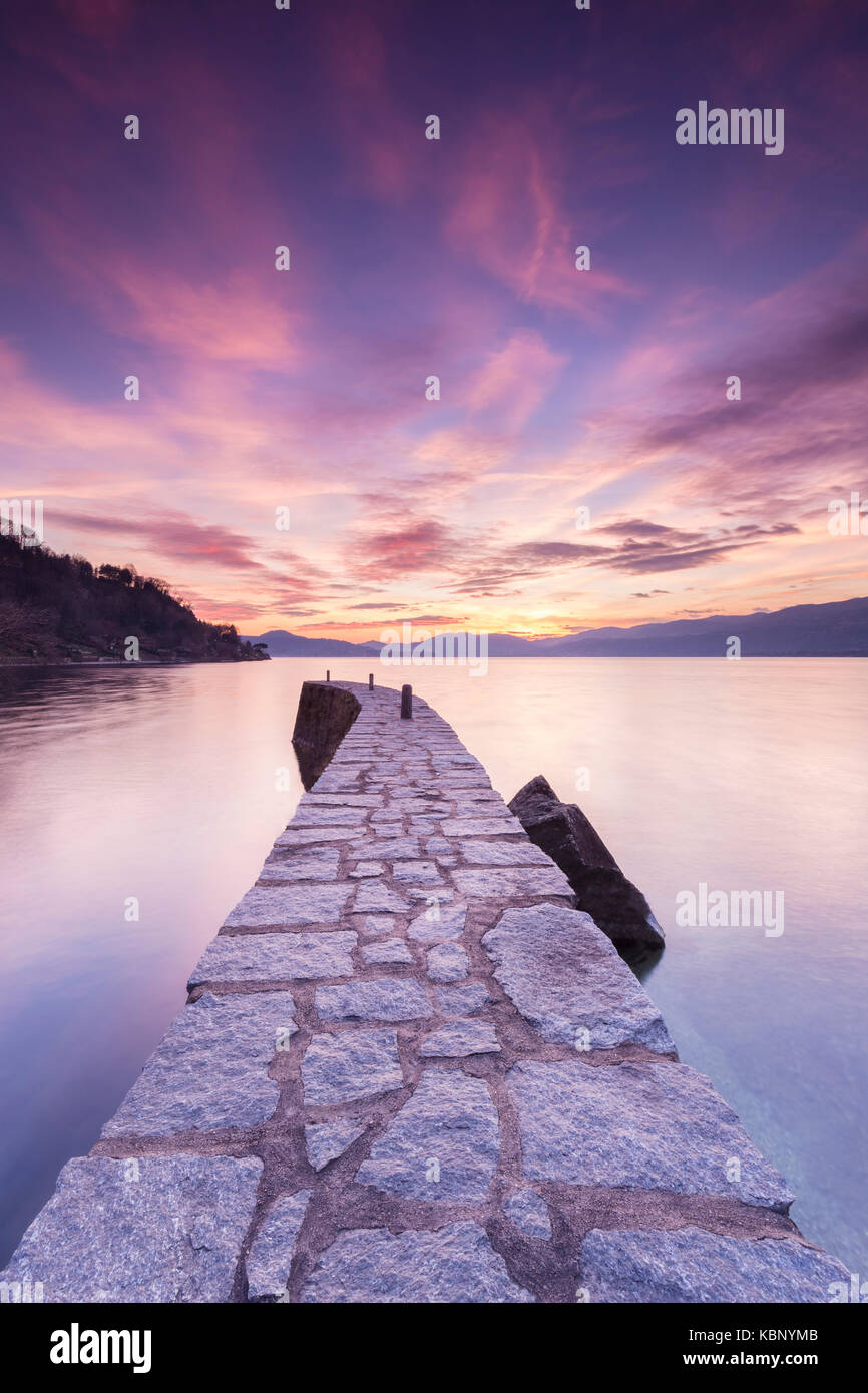 Sunset at the old pier, Lake Maggiore, Ispra, Varese Province, Lombardy, Italy. Stock Photo