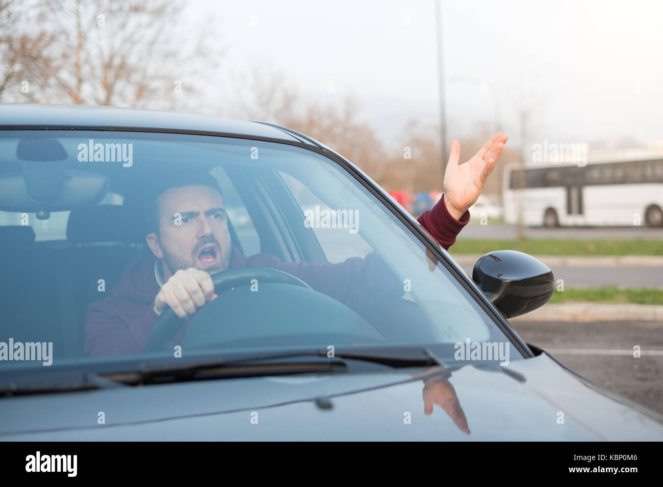 Rude man driving his car and arguing a lot Stock Photo Alamy