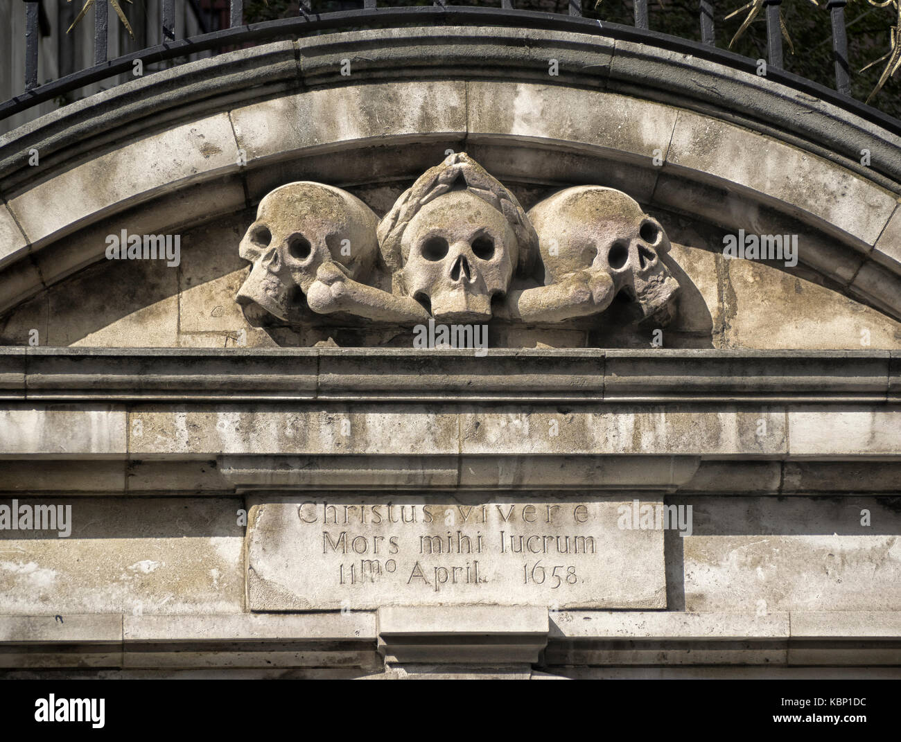 LONDON, UK - AUGUST 18, 2017:  Skulls over the entrance  of  St Olave's Church in Hart Street in the City of London Stock Photo