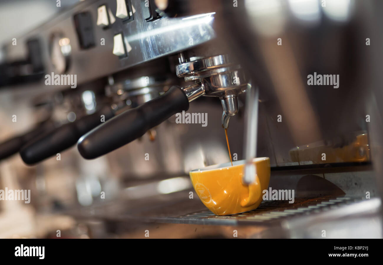 Barista making fresh coffee with machine Stock Photo Alamy