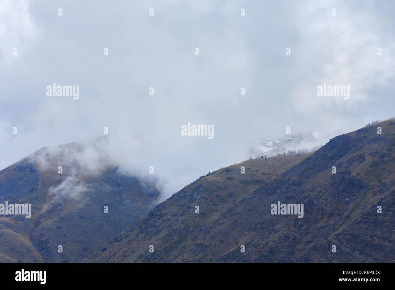Moving clouds over mountains hi-res stock photography and images - Alamy