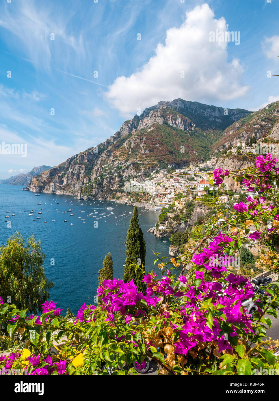 The homes of Positano cling to the bay and cliffs on the Amalfi coast in Italy Stock Photo