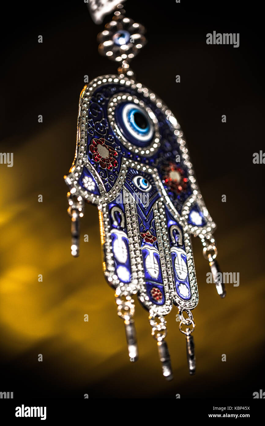 hanging tibetan hamsa made from metal Stock Photo - Alamy