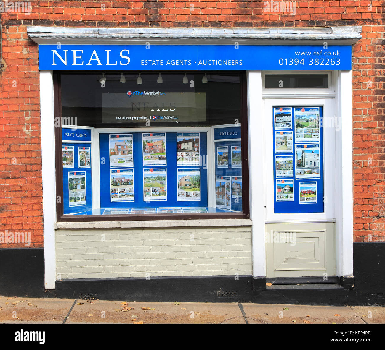 Neals estate agent shop window in Woodbridge, Suffolk, England, UK