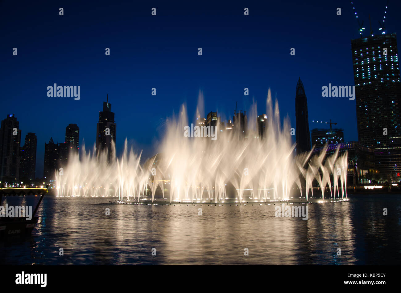 Illuminated Dubai Fountain at night Stock Photo - Alamy
