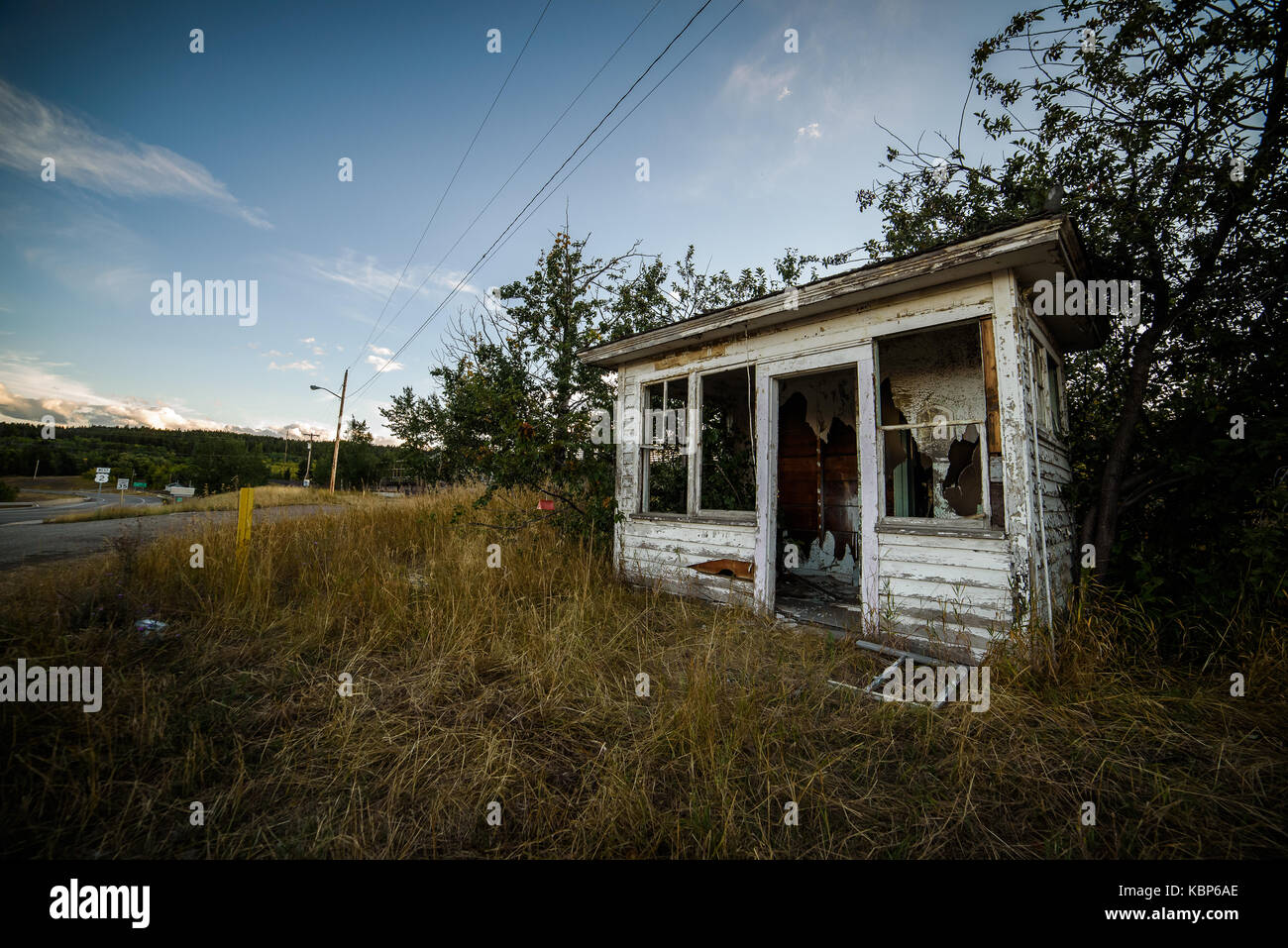 Broken down tiny house near side of road Stock Photo Alamy