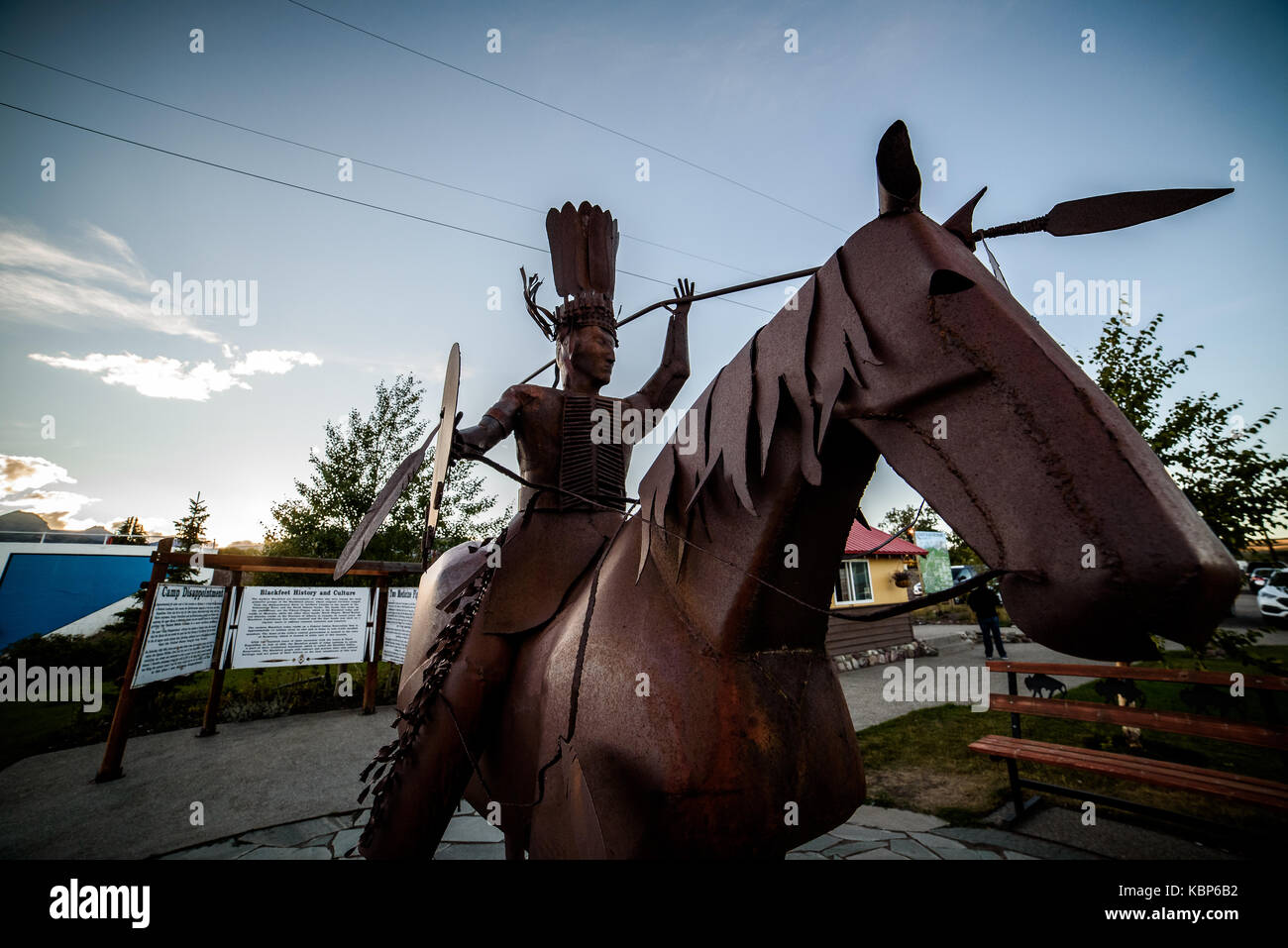 Blackfoot Indian Statue Made of Scrap Metal in Tourist Village of East Glacier, MT Stock Photo