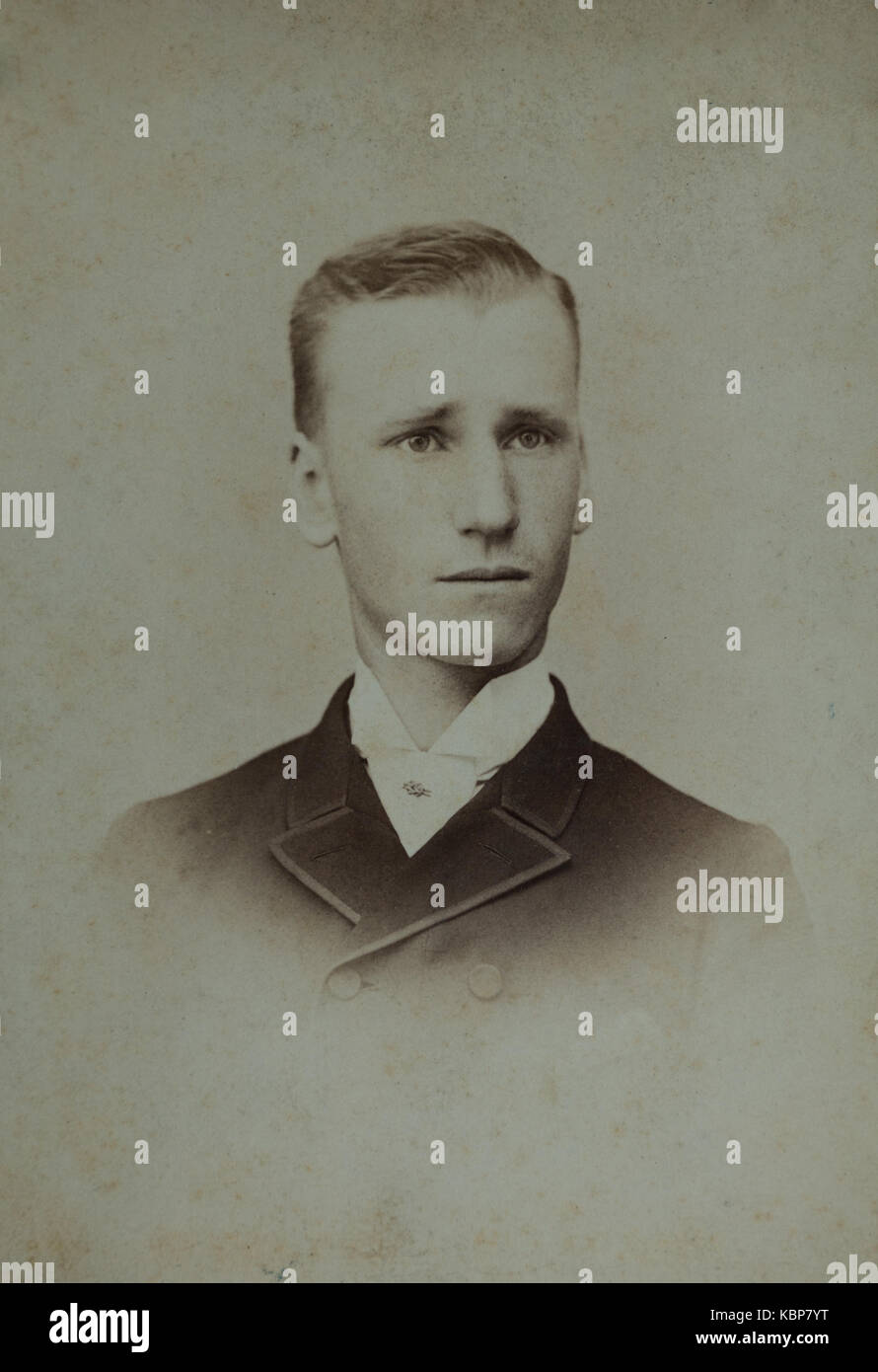 American archive monochrome studio portrait photograph of a young man, Charles Hadden, wearing a jacket and white necktie, taken in late 19th century at Ernsberger photographers, Auburn, NY, USA Stock Photo