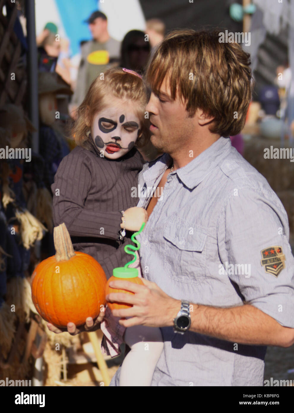 BEVERLY HILLS, CA - OCTOBER 11: Larry Birkhead and daughter Dannielynn Birkhead sighting at Pumpkin Patch on October 11, 2009 in Beverly Hills, California.  People:  Larry Birkhead,  Dannielynn Birkhead  Transmission Ref:  MNC    Credit: Hoo-Me.com / MediaPunch Stock Photo