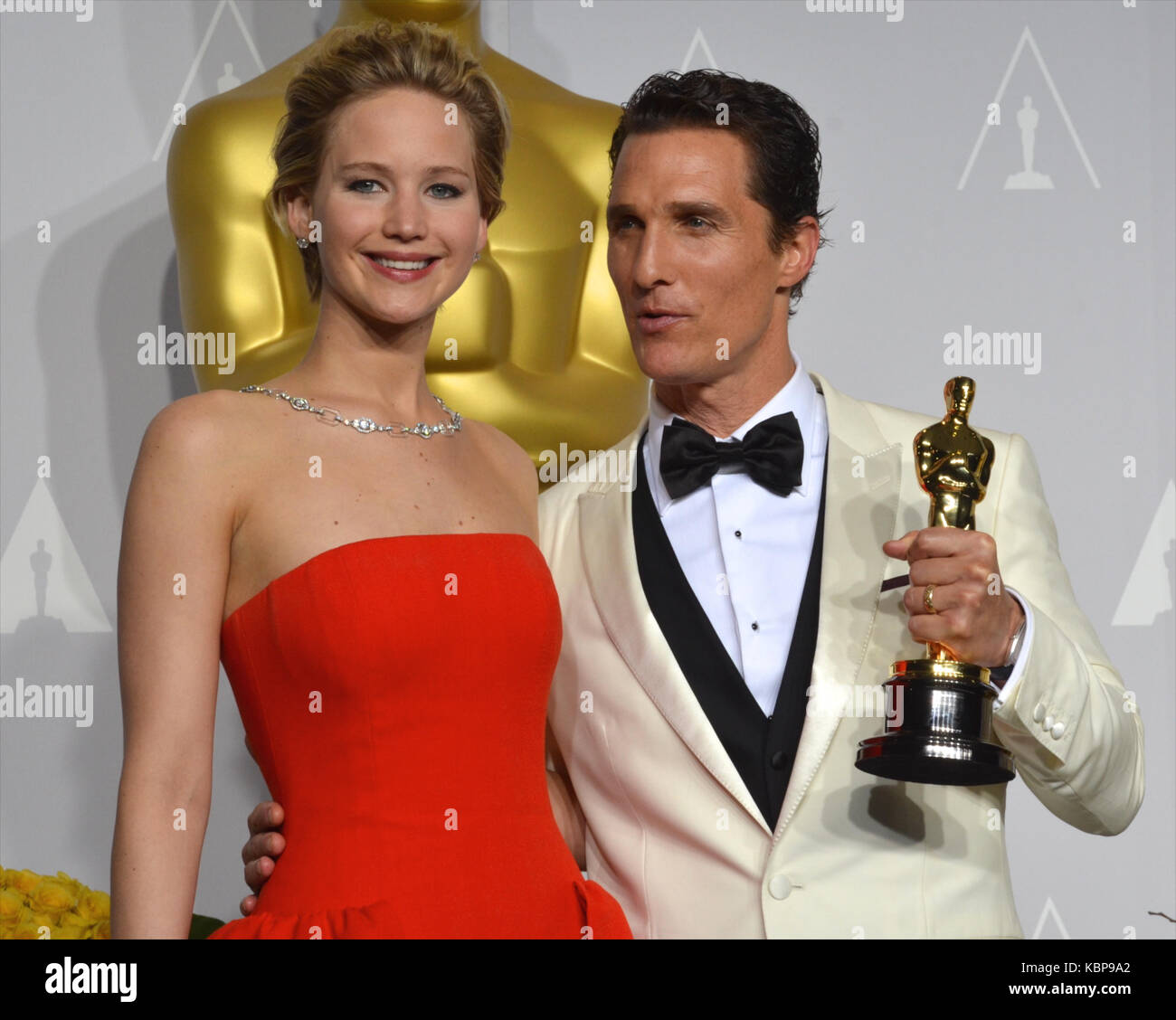 Actress Jennifer Lawrence and actor Matthew McConaughey poses in the