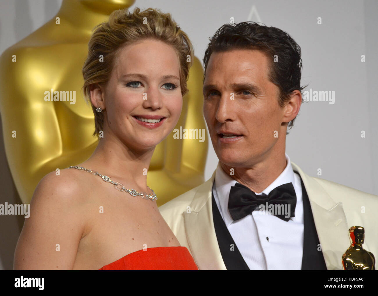 Actress Jennifer Lawrence and actor Matthew McConaughey poses in the