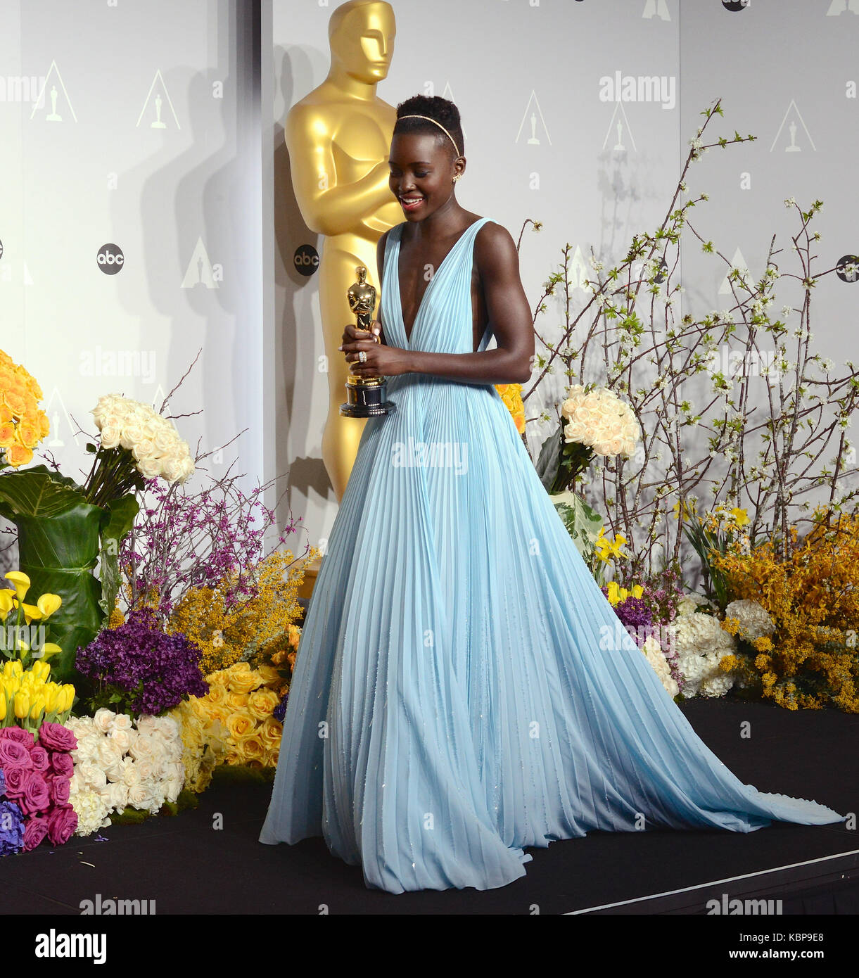 Best actress winner Lupita Nyong'o arrives at the 2014 Vanity Fair Oscar Party on Sunday, March 2, 2014, in West Hollywood, Calif. (Photo by Evan Agostini/Invision/AP Stock Photo - Alamy Best actress winner Lupita Nyong'o arrives at the 2014 Vanity Fair Oscar Party on Sunday, March 2, 2014, in West Hollywood, Calif. (Photo by Evan Agostini/Invision/AP Stock Photo - Alamy