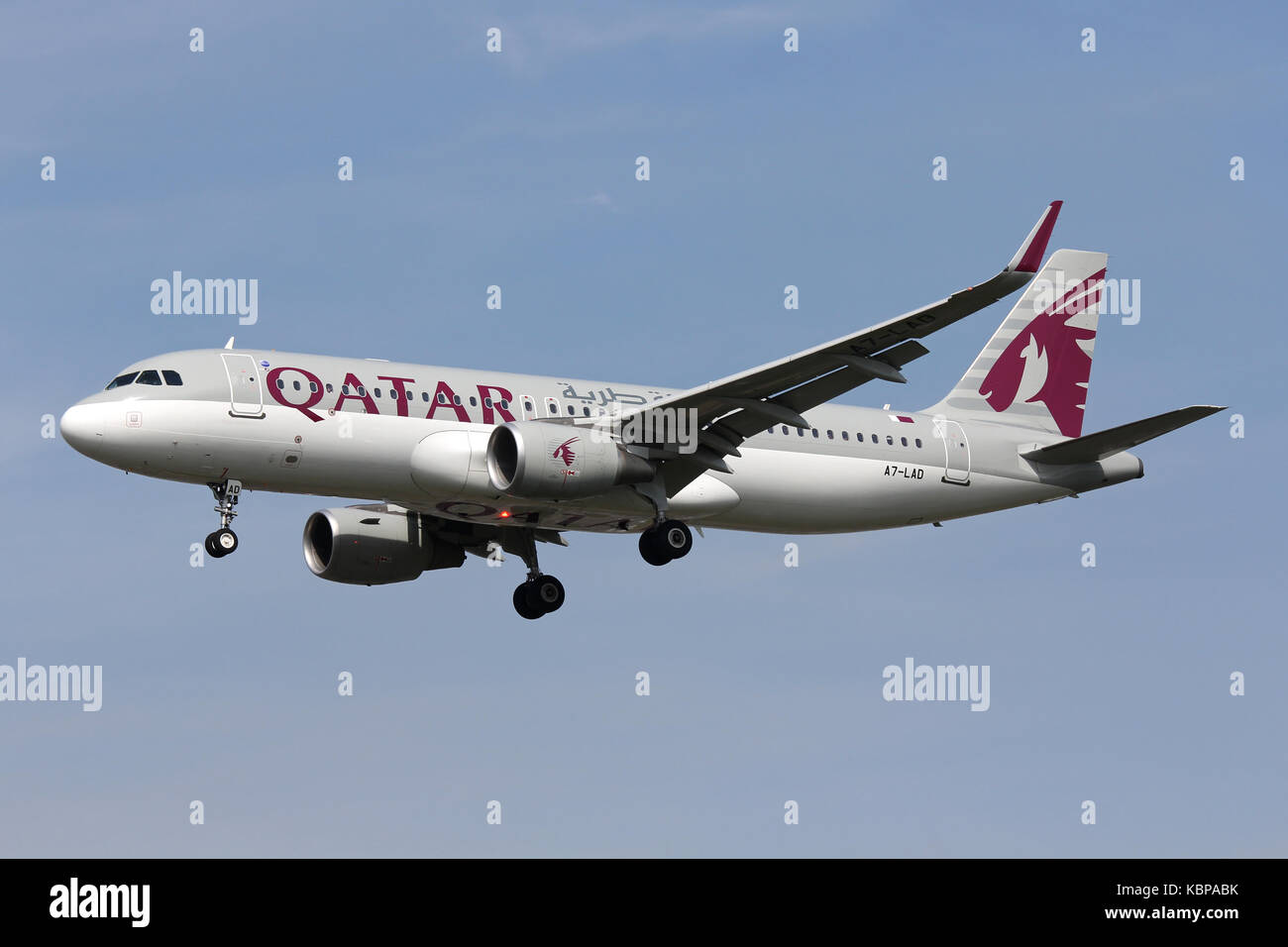 Qatar Airways A320 A7-LAD landing at London Gatwick airport Stock Photo