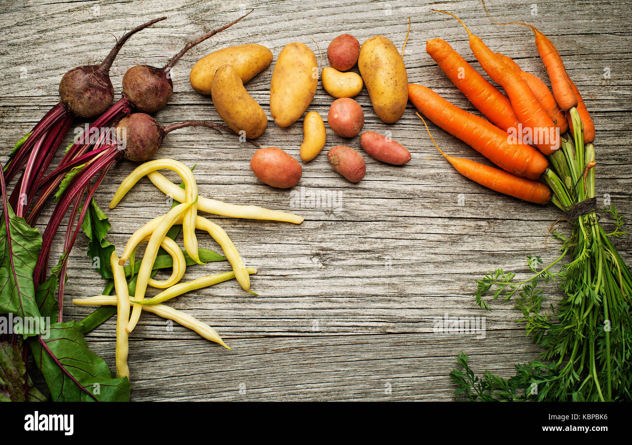 Fresh vegetables on wooden background Stock Photo - Alamy