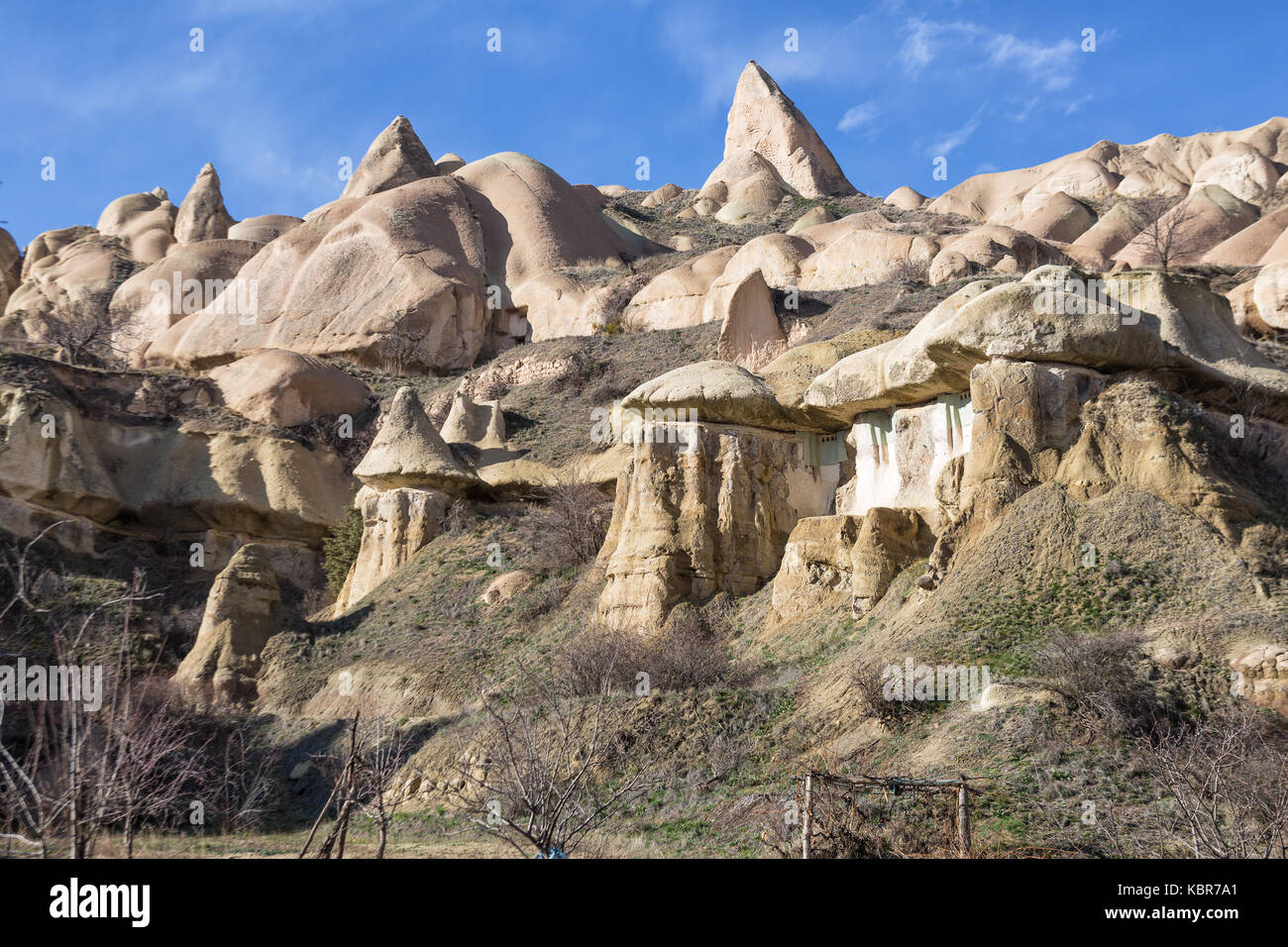 Pigeon valley - scenic canyon at the bottom of which is paved pedestrian trail between towns of Goreme and Uchisar. Cappadocia, Turkey Stock Photo