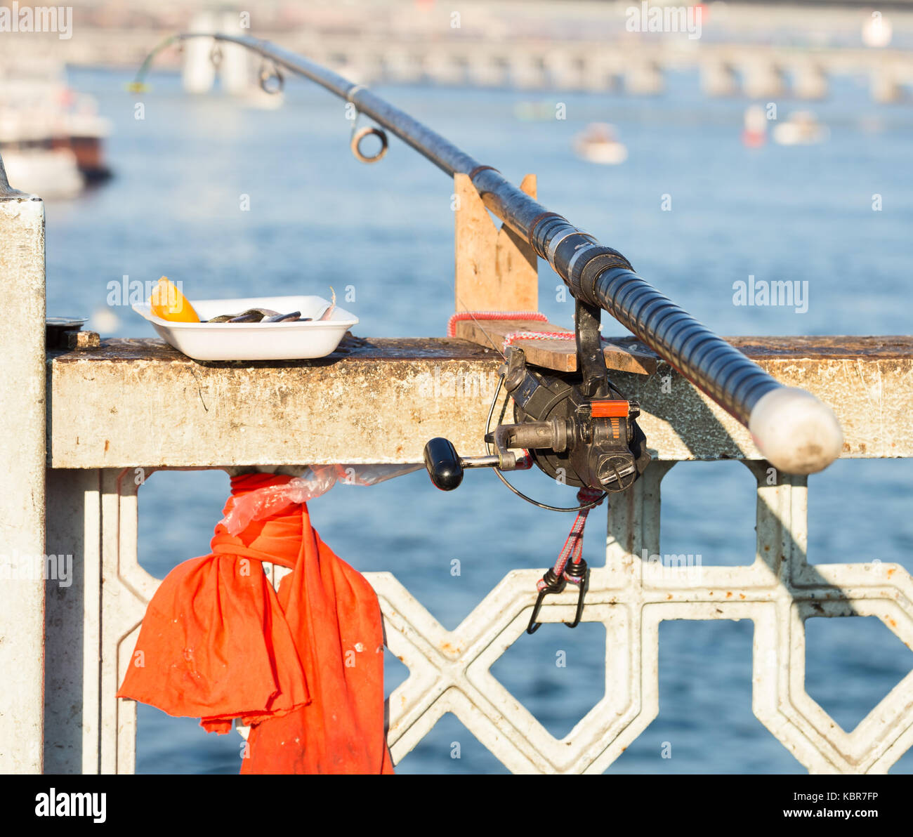 Fishing rod, attached to the railing of the Galata Bridge, Istanbul, Turkey  Stock Photo - Alamy